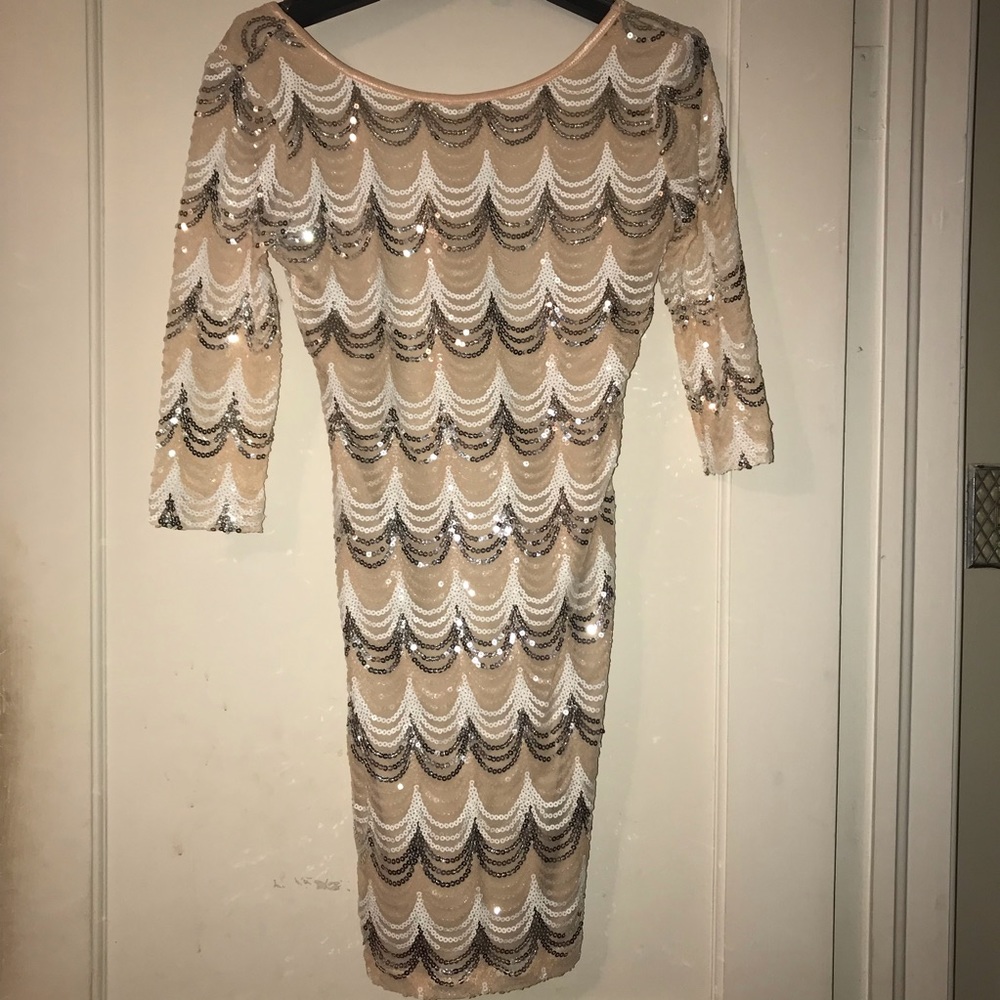 Pink, silver, and white glittery dress.